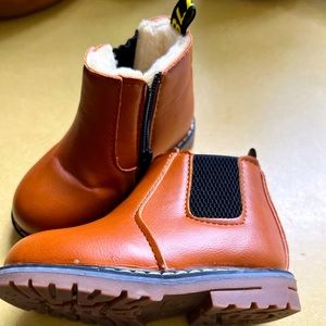 Brown leather boots with fur lining